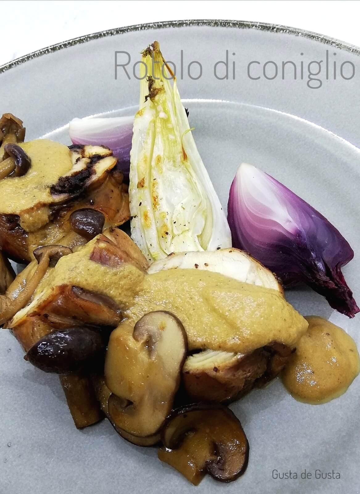 Rotolo di coniglio ai funghi con finocchi e cipolla